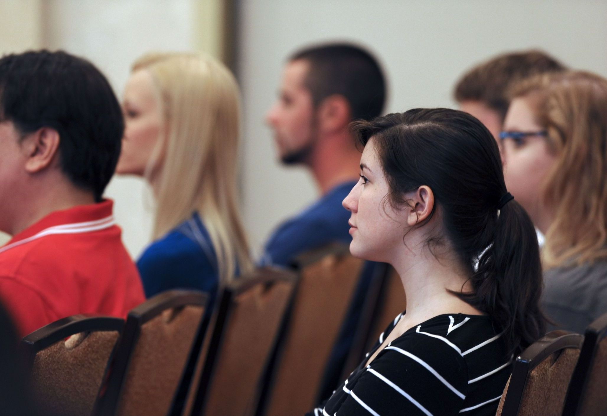 Rows of students listening to a lecture.