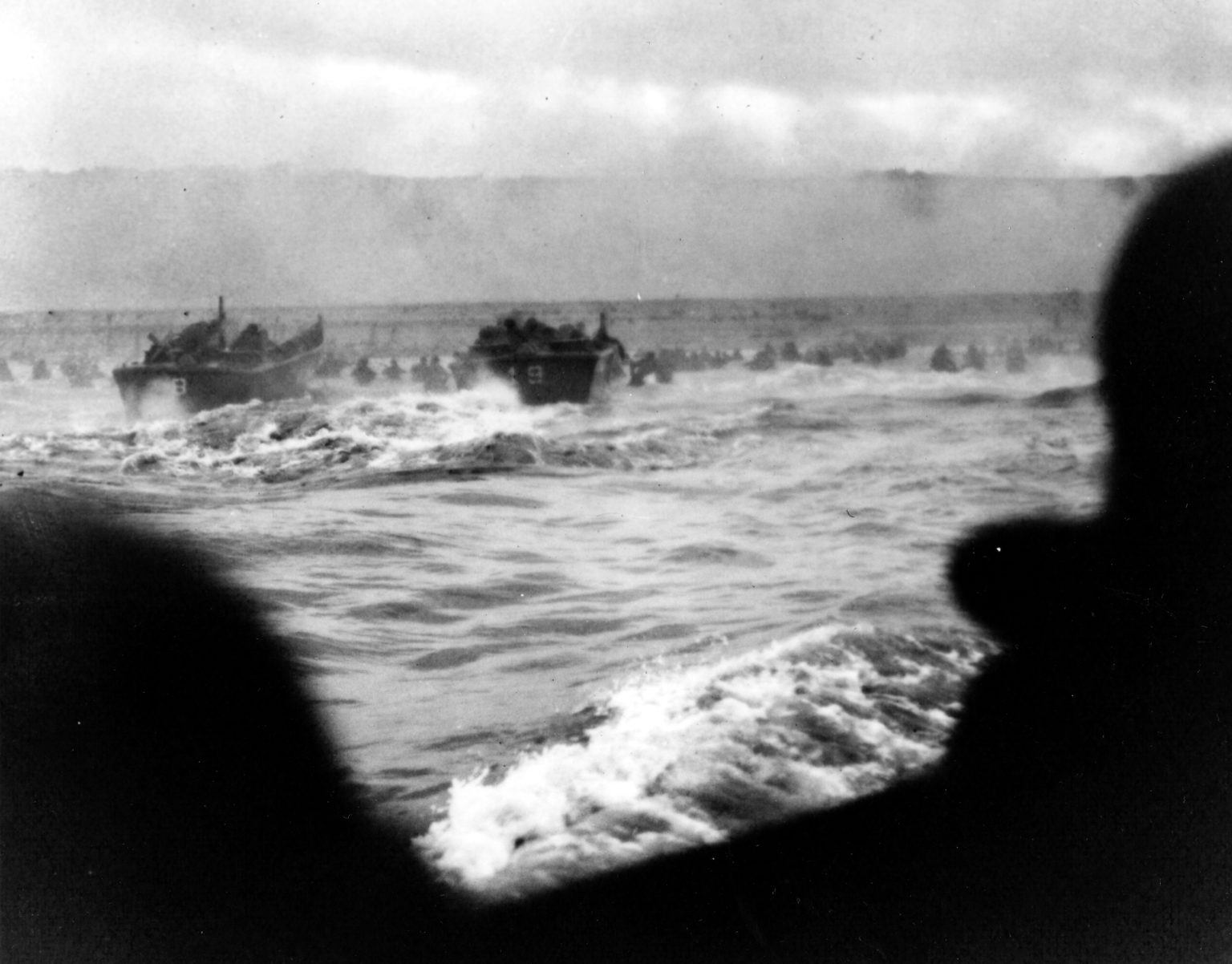 US Navy landing craft put the fist wave of American troops ashore on Omaha Beach on D-Day