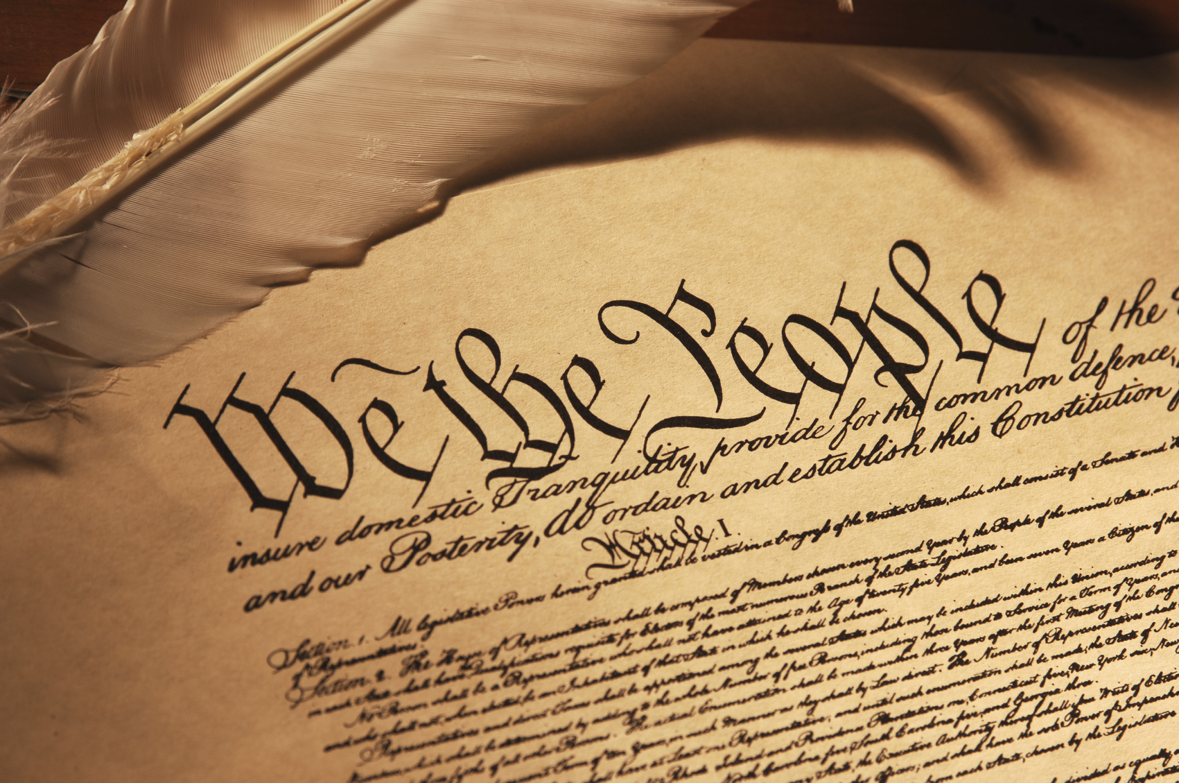 Close up of the Constitution of the United States of America with quill feather pen