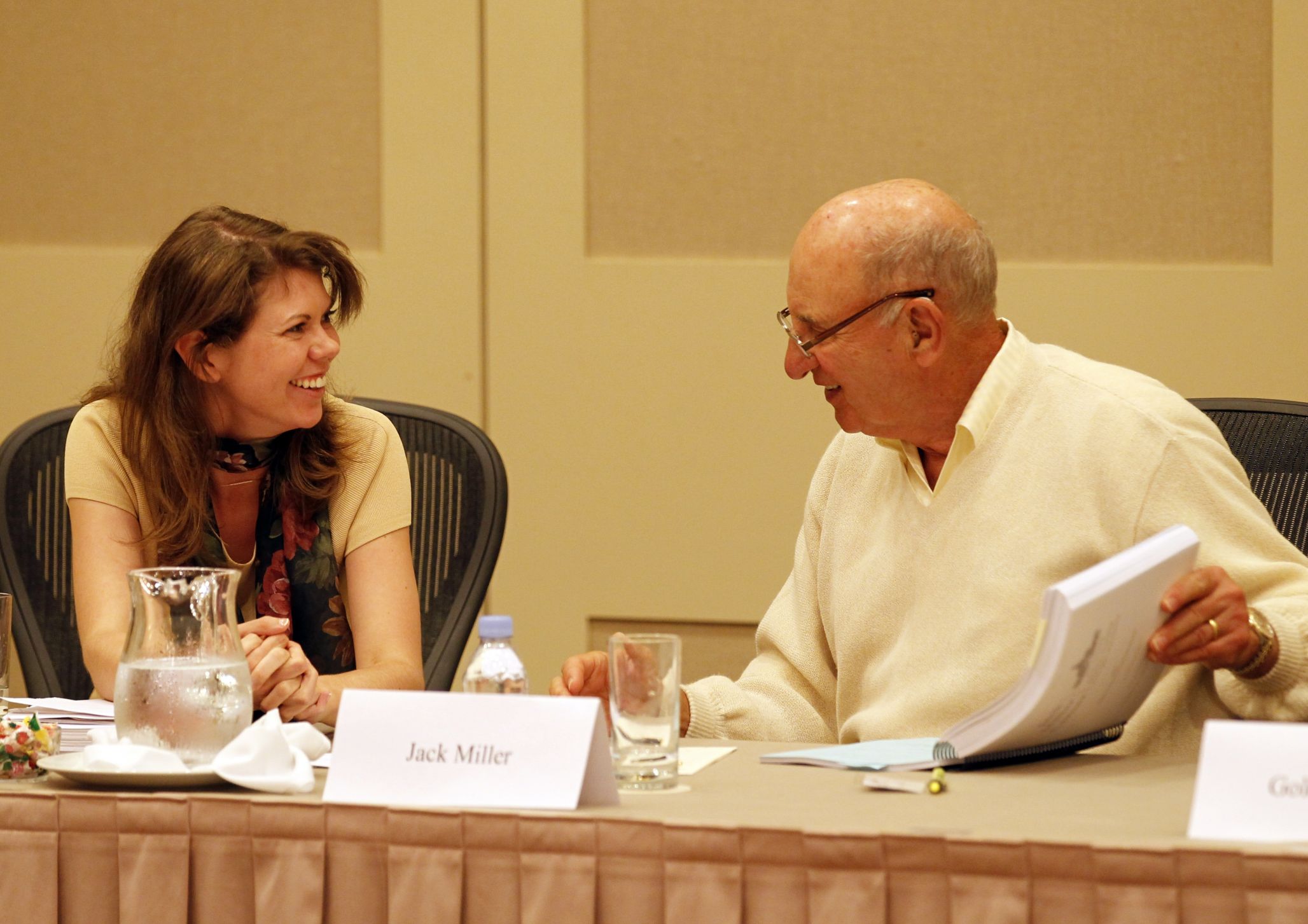 Jack Miller and a Miller fellow talking and smiling at a summer institute