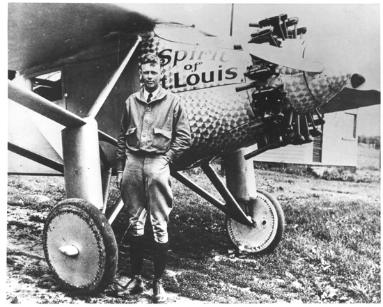 Charles Lindbergh standing in front of his 