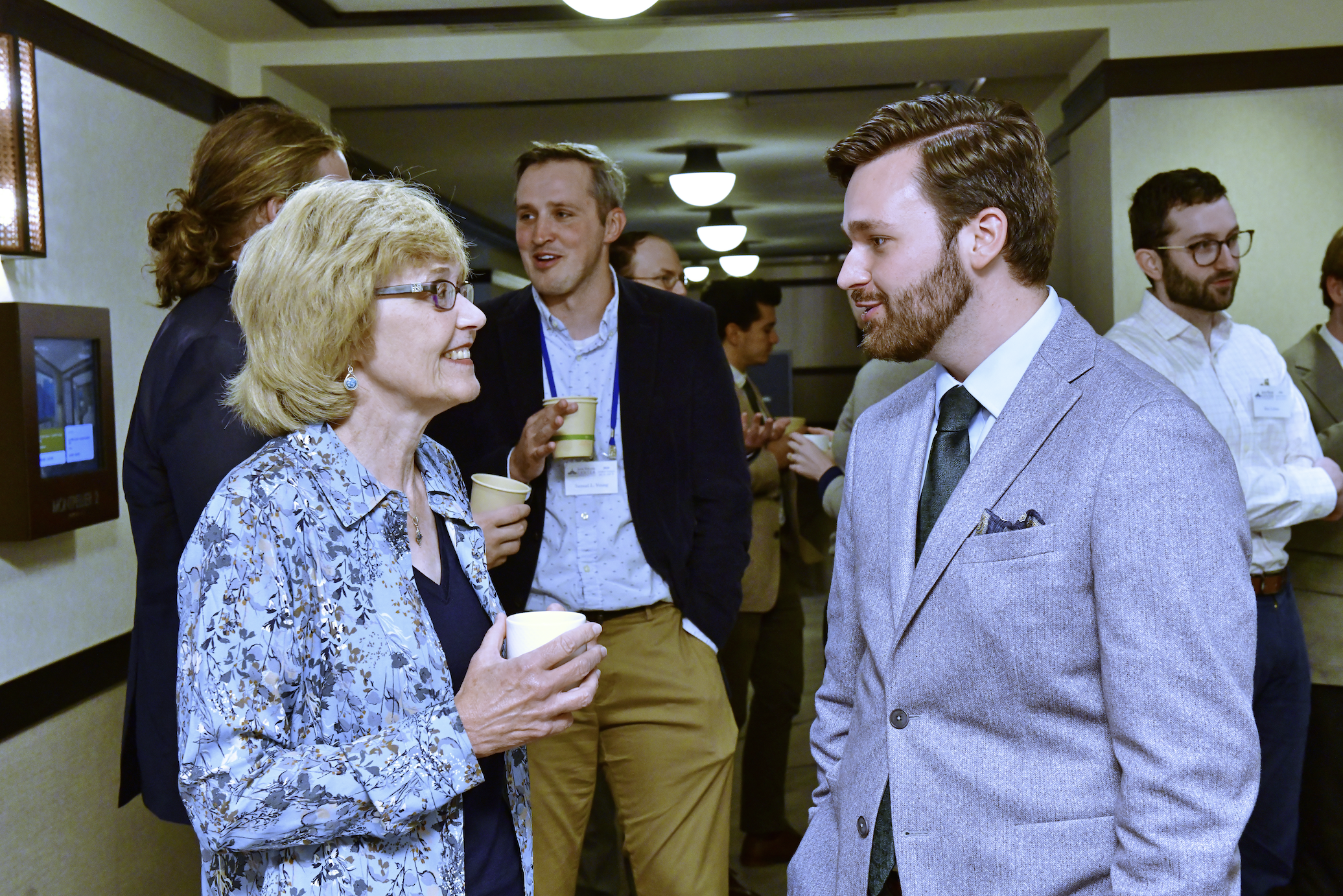 Prof. Diana Schaub speaking with a Miller Fellow at the 2024 Summer Institute between sessions