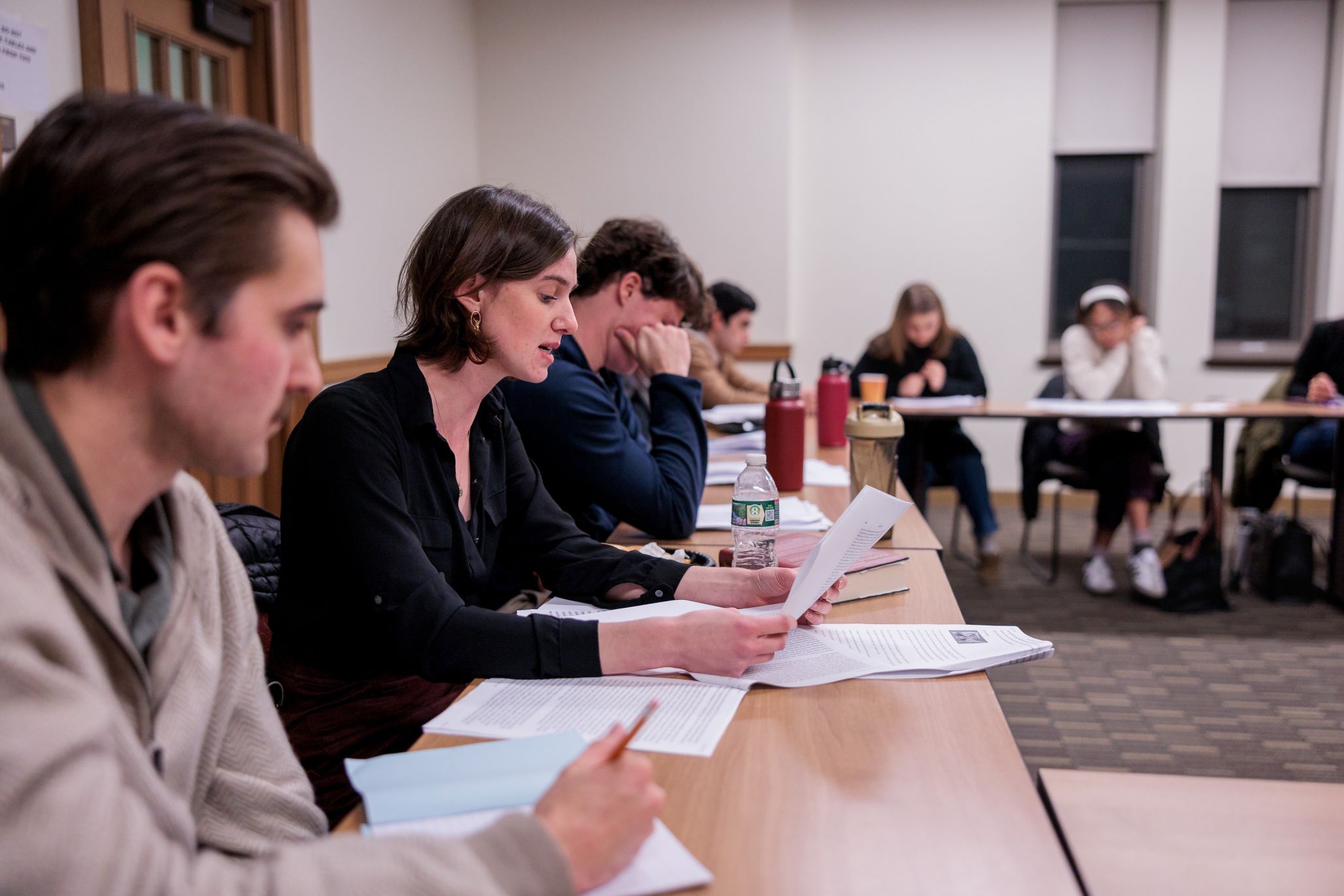 Female student speaking during a Boston College reading group discussion